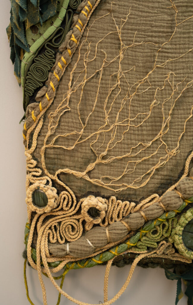 Close-up of Old Growth fiber sculpture creeping roots