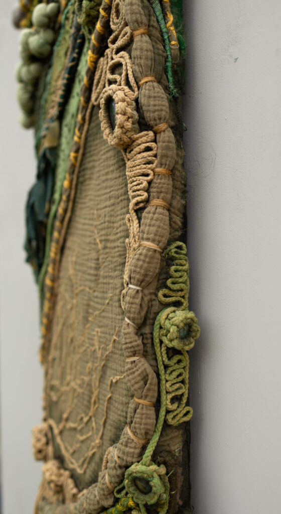 Side view of Old Growth fiber sculpture.